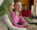 Two women in front of computer